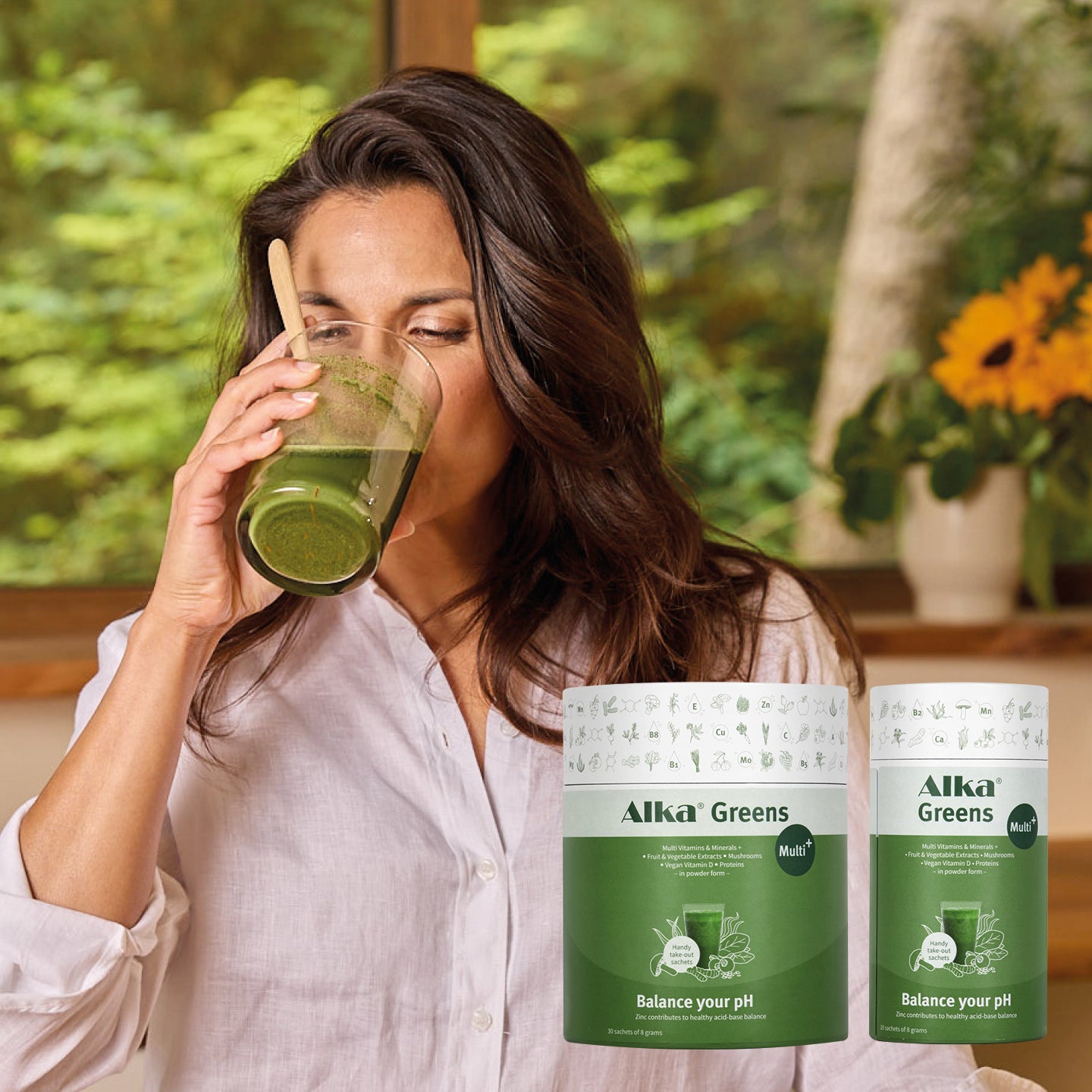 Woman drinking Alka Greens